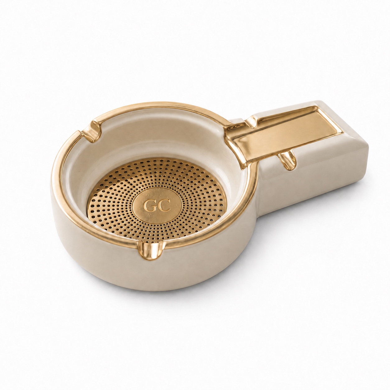 Aperture Ashtray in glazed ceramic and polished brass photographed on white