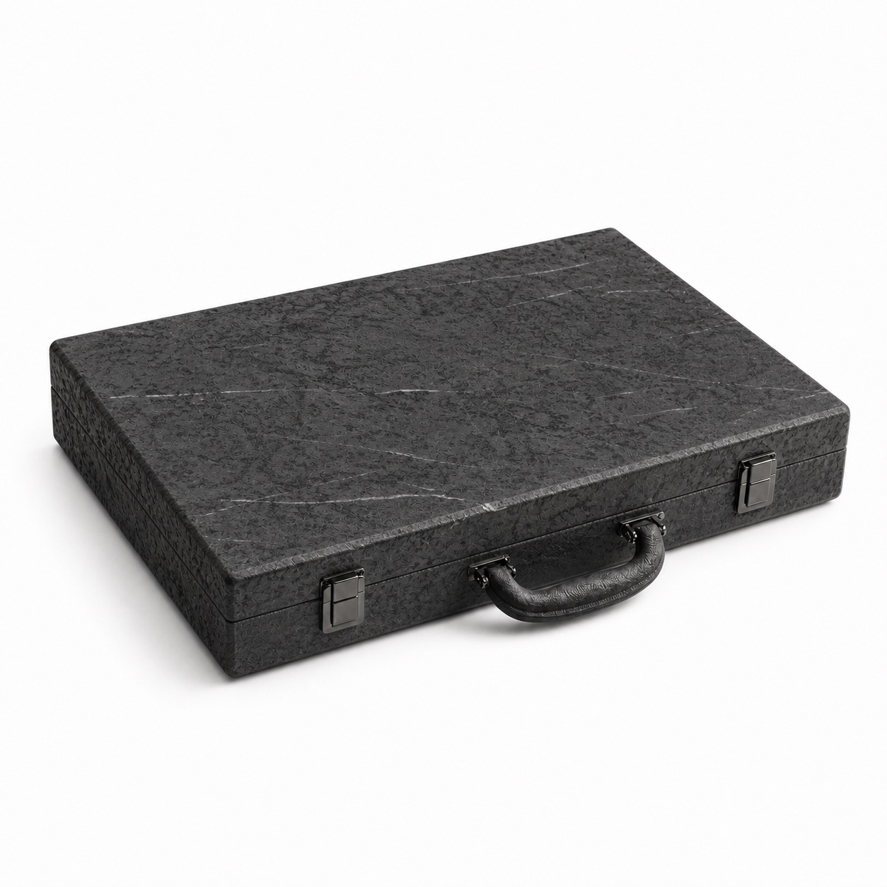 Closed Monolith Backgammon Set shown as a dark stone travel case on white