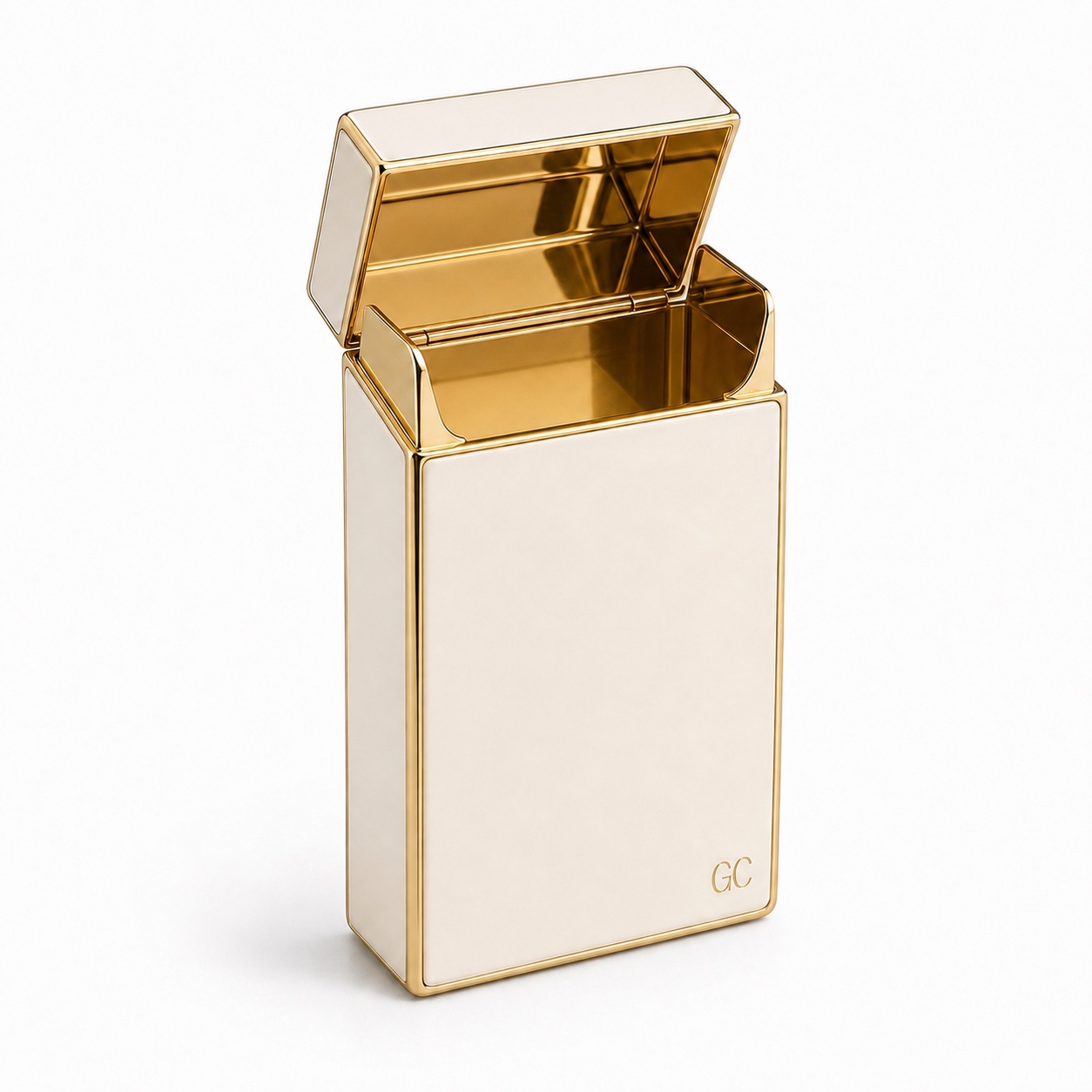 Empty Vitrine Cigarette Case showing its polished brass interior and hinge on white